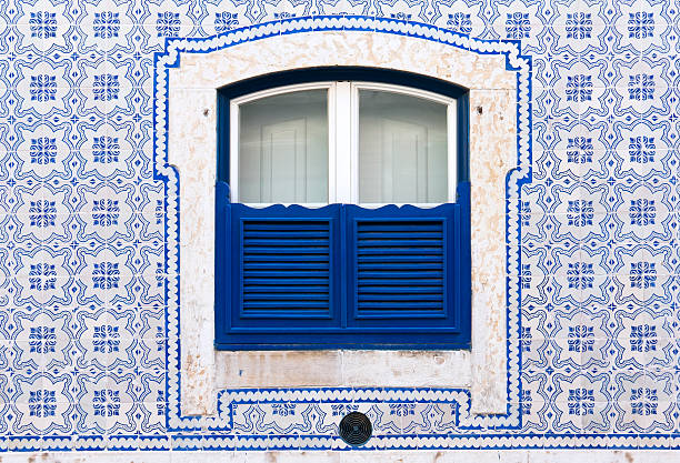 Traditional Portuguese azulejo tiles on a historic facade in Portugal
